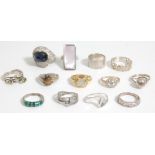 A group of ladies silver rings to include a statement crossover ring set with a large faceted