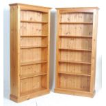 A pair of good quality antique Victorian style country pine tall 6ft bookcase cabinets. Each of open
