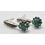 A pair of silver 925 hallmarked drop earrings set with marcasite's and faux emeralds. Measures: 2.