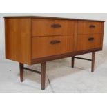 A good vintage retro 20th century G plan teak wood sideboard having a bank of four drawers raised on