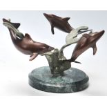A good quality late 20th Century vintage bronze statue of three dolphins swimming round seaweed on a