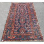 An early 20th century Persian / Islamic Bokhara floor rug – carpet. The rug being handwoven with a