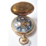 A 20th Century Masonic gold plated pocket watch having a round face with a black ground having