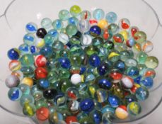 A large collection of believed 19th century and 20th century glass marbles. All of varying sizes and