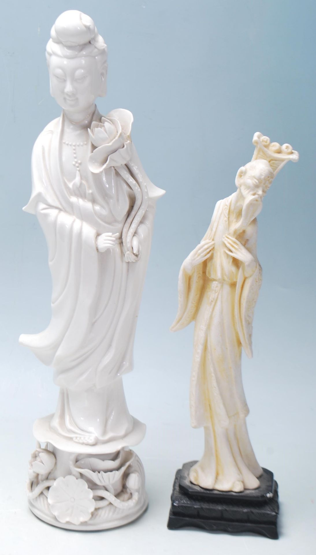 A 20th Century Chinese blanc de chine figurine depicting a female figure in traditional dress