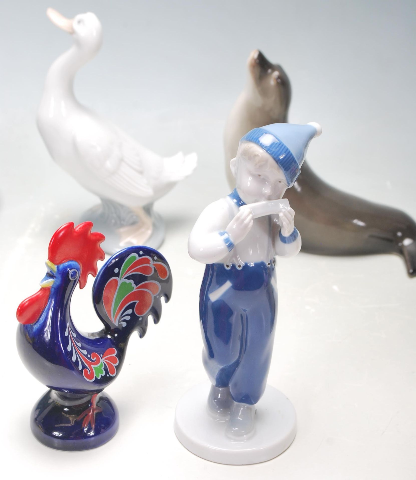 A collection West German Goebel and USSR Russian porcelain animals to include boy, elephant, seal, - Bild 6 aus 15