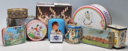 A collection of vintage tins to include black and white minstrels, Somerdale, Toffee tins, Quality