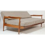 Guy Rodgers ( British 20th century ) A Manhattan style teak wood sofa / day bed, by Guy Rodgers. The