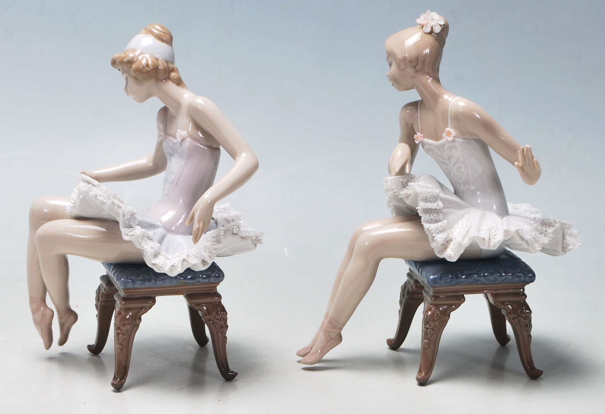 LLadro - A pair of late 20th Century vintage ceramic ballerinas comprising two seated girls getting - Image 4 of 6