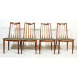 A set of four retro mid 20th Century G plan Fresco range teak framed rail back dining chairs
