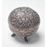 A 20th Century Indian Lucknow silver domed trinket pot of round form having a domed lid raised on