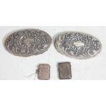A pair of silver hallmark vesta cases having engraving decorations to the body, hinged lid,