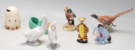 A good collection of 20th century assorted porcelain animals figurines to include Nao, Lladro,