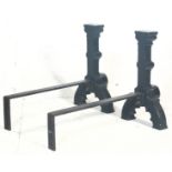 A pair of substantial antique Victorian Jacobean style cast iron gothic fire dogs / andirons