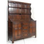 A 20th century Ercol dark Jacobean revival - Old Colonial beech and elm wood dresser having