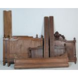 Two 19th century French walnut / fruitwood beds. Each with panelled head and footboards having