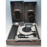A vintage Marconi Marconiphone turntable, with grill speaker front set with articulated running