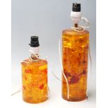 Prove - Shatterline - A pair of vintage 20th Century tangerine orange / amber coloured lamp bases of