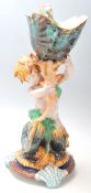 A fine quality 19th century Wedgwood majolica plinth in the form of a mermaid holding a