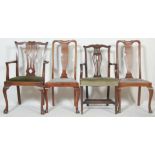 A set of 4 1920's mahogany Chippendale revival dining chairs. Raised on cabriole legs with pad