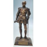 A late 19th century early 20th century Austrian school bronze figurine of King Arthur raised on a