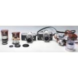 A group of vintage 35mm cameras to include : NIKKOTMAT FT No 4526994 with Nikon Nikkor-H Auto 1:2