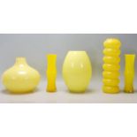 A mixed collection of retro vintage late 20th Century studio art glass ware in canary yellow to
