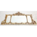 A 19th Century Regency gilt moulded mantel mirror having three mirror panels the frame being moulded