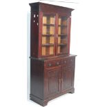 A Victorian 19th century oak library bookcase cabinet. The bookcase raised on plinth base with