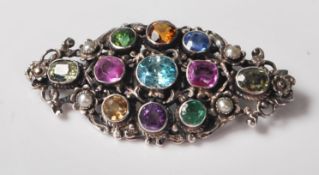 An early 20th Century silver gem set brooch being