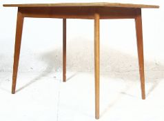 MID CENTURY TEAK AND FORMICA TOPPED DINING TABLE