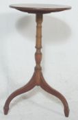 A 19th century George III mahogany tripod wine tab