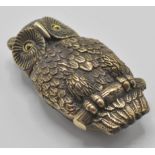 An unusual novelty brass vesta case in the form of