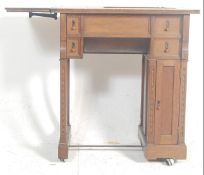 An early 20th century Edwardian sewing table machi