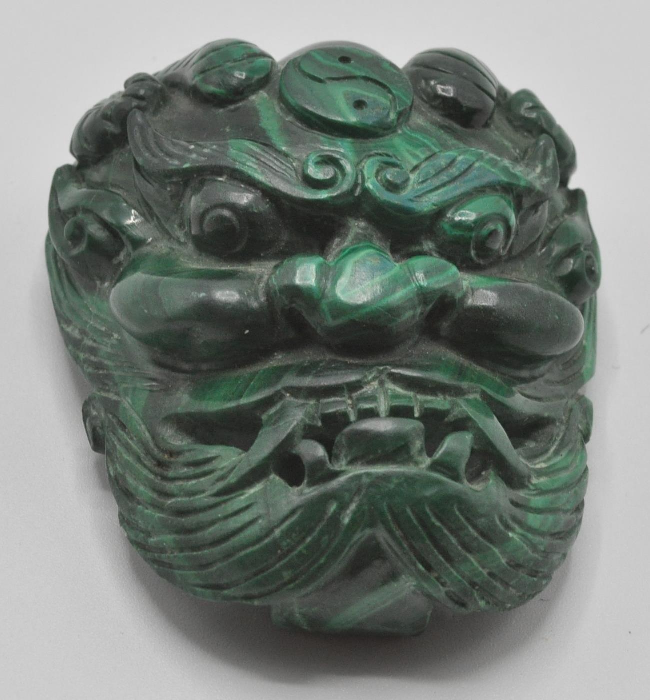 An unusual contemporary chines malachite belt buck