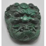 An unusual contemporary chines malachite belt buck