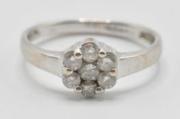 A vintage 20th Century white gold and diamond clus