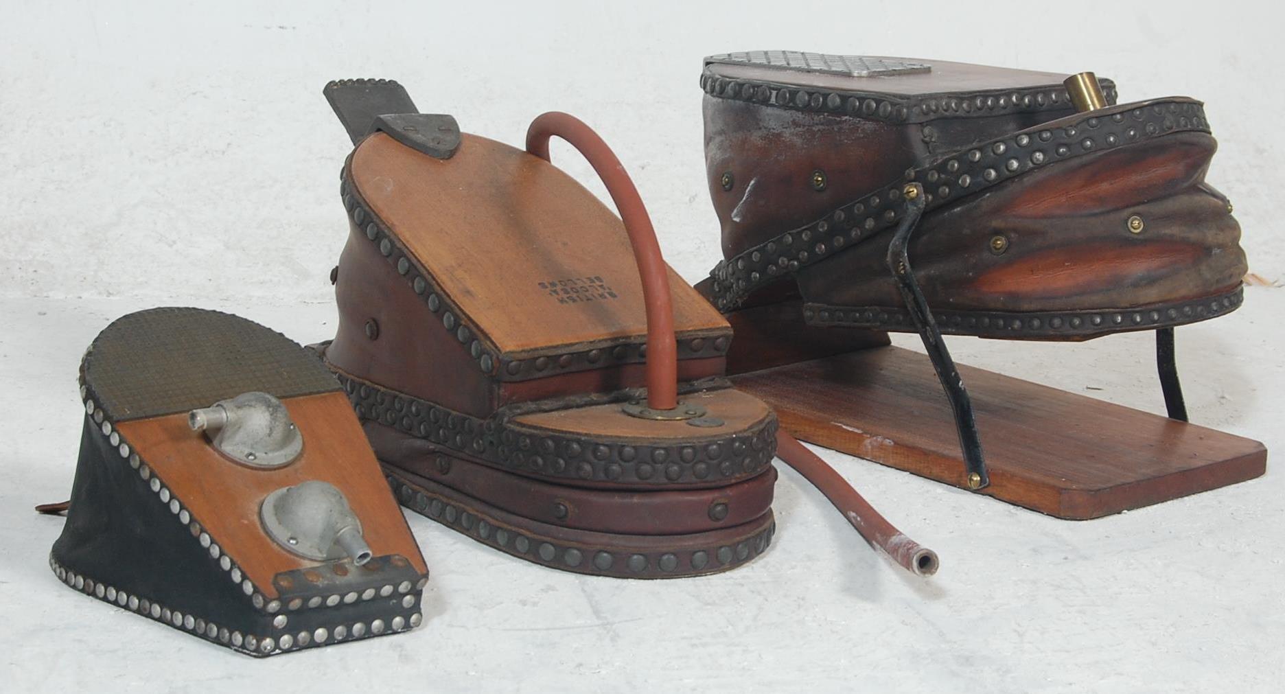 A collection of three 20th century antique foot ac