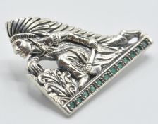 A stamped sterling silver brooch in the form of a