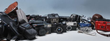 A collection of late 20th Century cameras to inclu