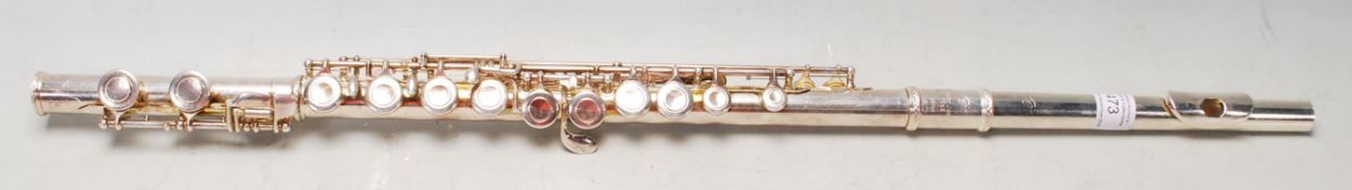 A late 20th Century silver plated straight flute b