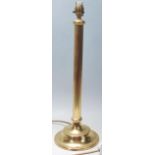 A 20th Century tall brass Corinthian column table