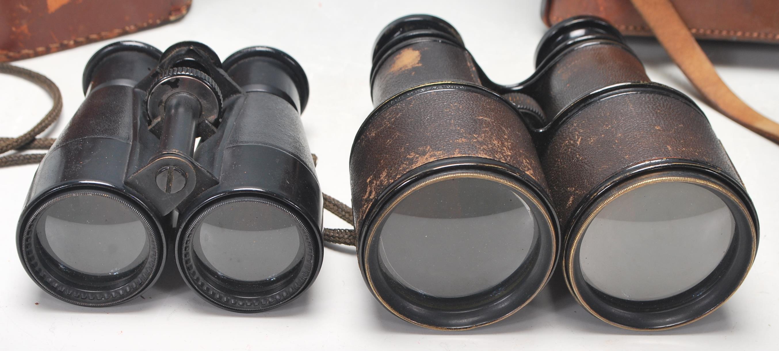 Two vintage 20th Century pairs of binoculars to in - Image 4 of 5