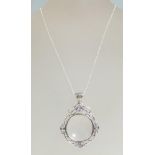 A ladies silver 925 necklace with a silver magnify