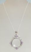 A ladies silver 925 necklace with a silver magnify