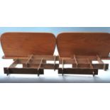 A PAIR OF TEAK WOOD BOOKENDS AND WALL HANGING MINI SHELVES
