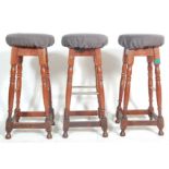 AN ANTIQUE STYLE OAK PUB STOOLS.