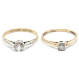 TWO 9CT GOLD AND WHITE STONE SOLITAIRE RINGS