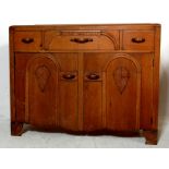 A vintage 1930's Art Deco oak dresser - sideboard having three short drawers over two cupboards at