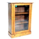 A 19TH CENTURY VICTORIAN PINE CABINET.